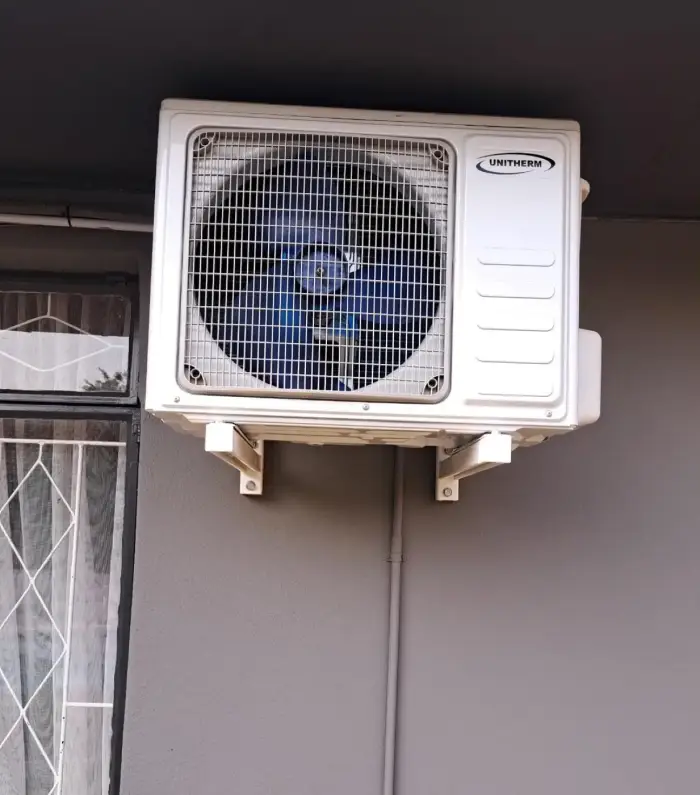 Unitherm outdoor condenser on wall brackets by SJS Cooling
